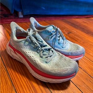 Well loved- Blue and red Hoka One One Clifton 8 running shoes #running